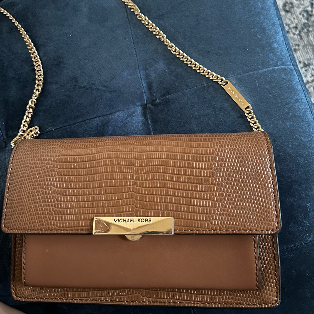 Authentic used and good condition Michael Kors Crossbody in Tan with gold chain